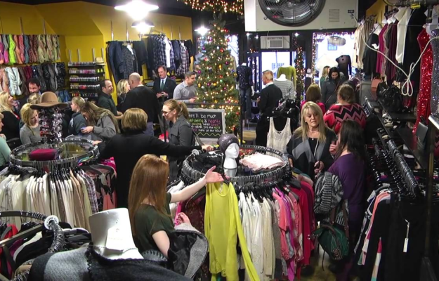 Shoppers in Elixer Clothing Shop in Downtown Lake Orion
